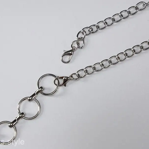 Silver metal chain belt accentuating the Metal Chain Halter Maxi Dress for summer parties