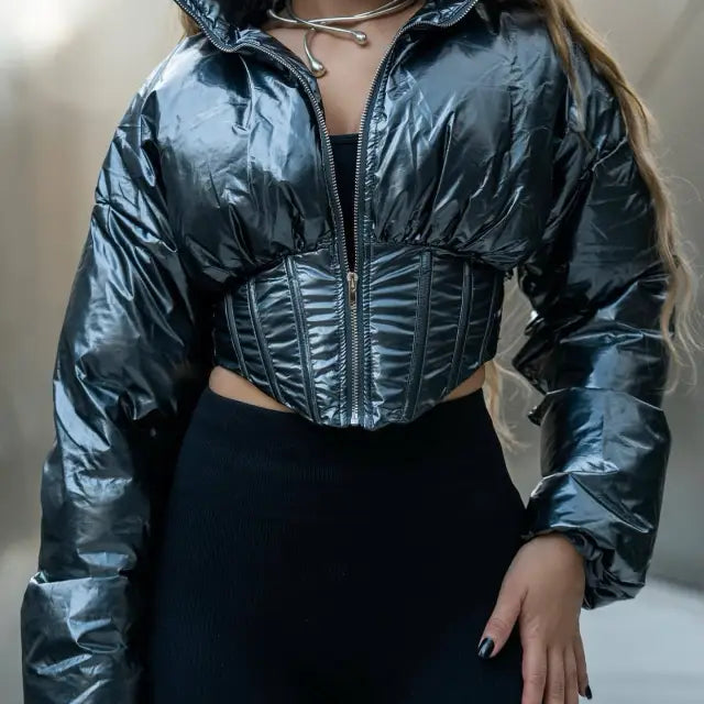 Shiny black puffer jacket with corset detail in a modern winter coat cutout design