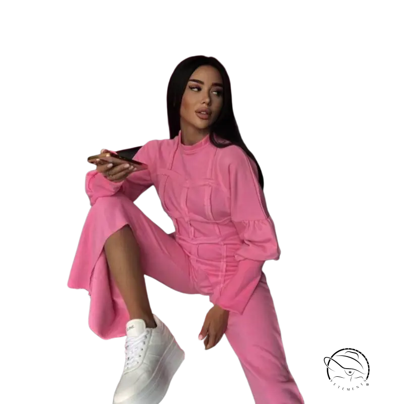 Woman in bright pink modern hoodie sets pullover, posing on striped bench