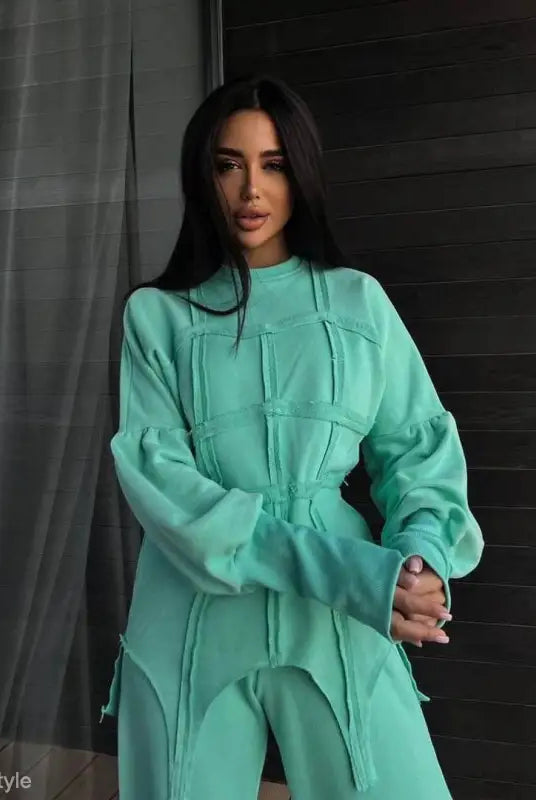 Mint green oversized sweatshirt with geometric stitching details in modern hoodie sets style