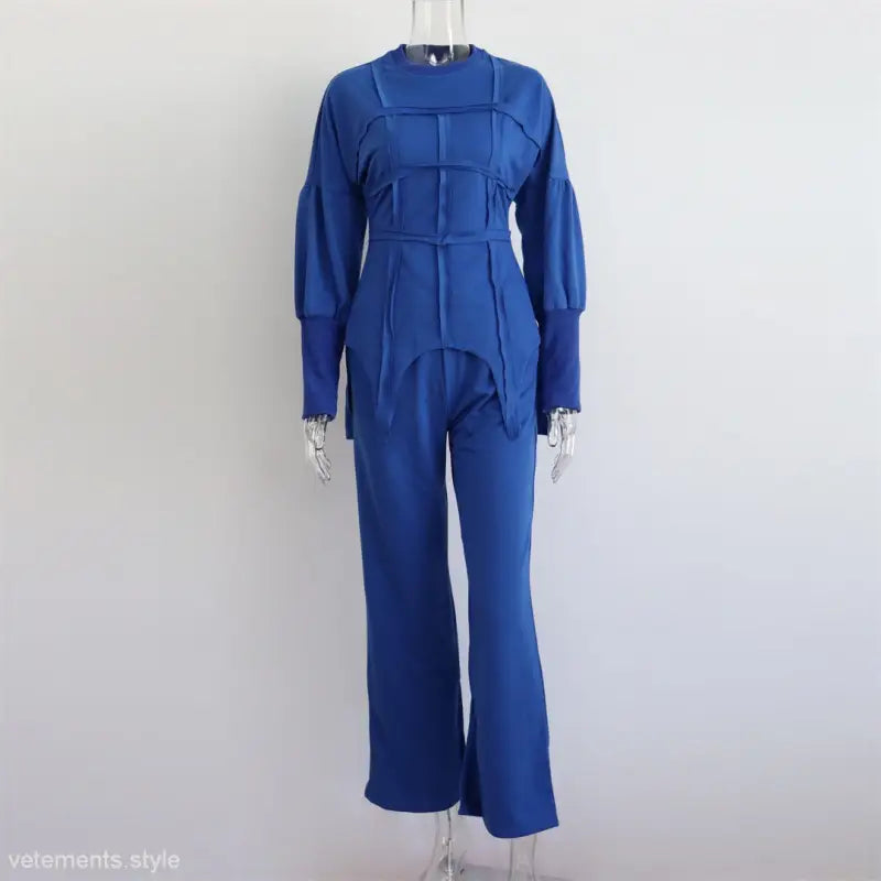 Blue long-sleeved jumpsuit with structured bodice and flared pants, perfect modern hoodie sets