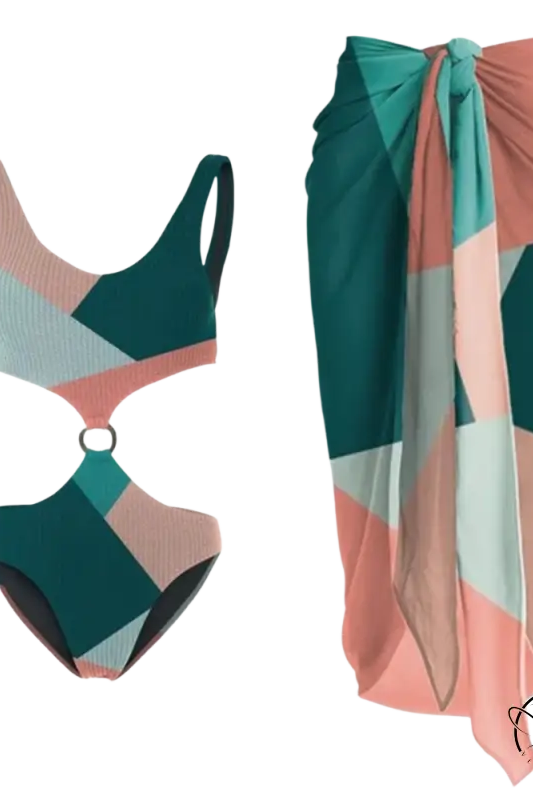 Multicolor one-piece bikini with geometric teal, pink, gray patterns and ring detail