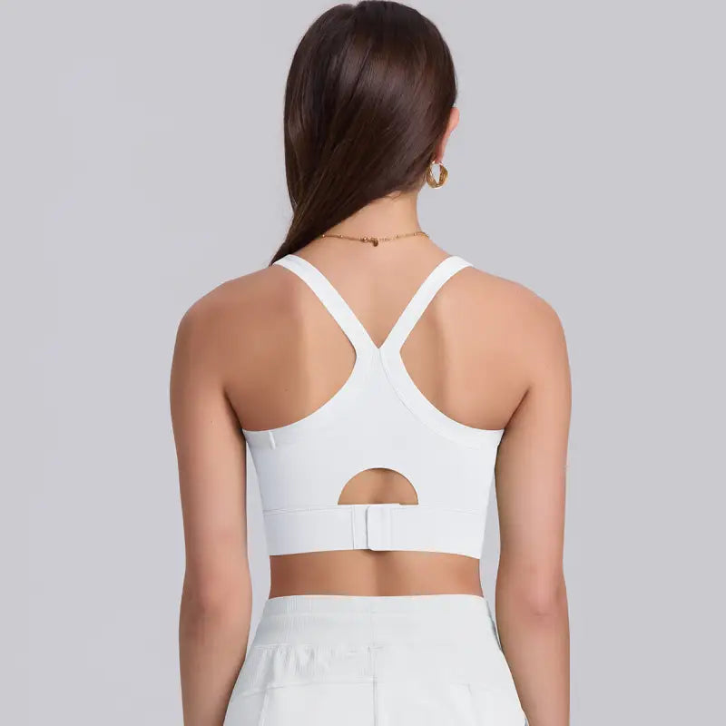White sports bra with racerback straps, part of Navy Blue Sporty Slim Nylon Strength Yoga Bra collection for high strength yoga activities