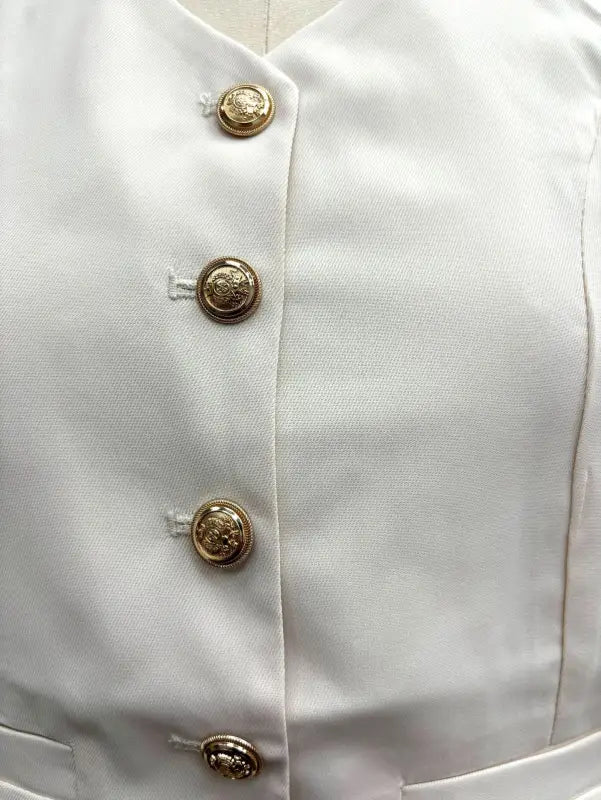 White button-down garment with gold-toned buttons, part of Navy Blue Summer High Grade Casual Suit
