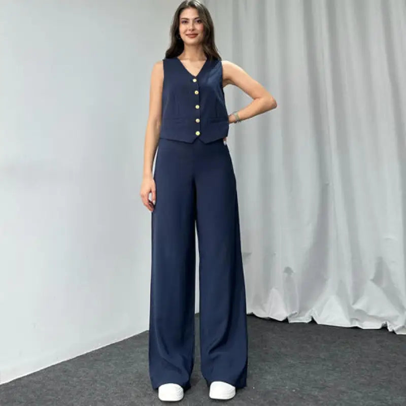 Navy blue summer high grade casual suit with sleeveless vest and wide-leg pants featuring gold buttons