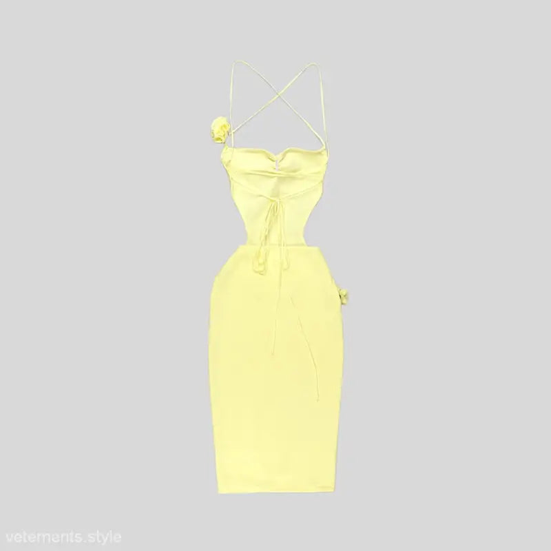 Pale yellow lace backless bodycon midi dress with cut-outs and floral embellishments