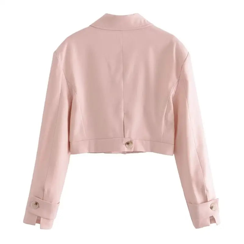 Pale pink cropped blazer high with long sleeves and button cuffs for pink pants look