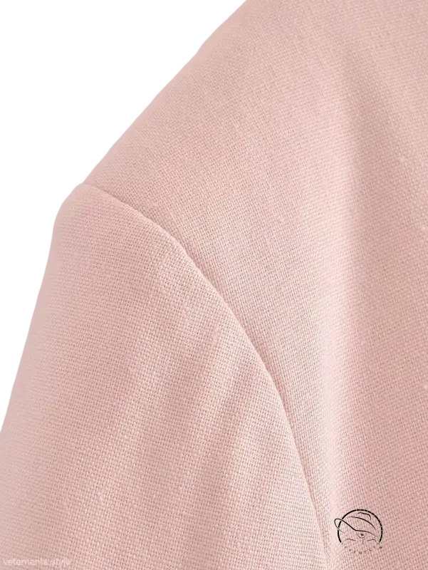 Pale pink linen blend short blazer with visible shoulder seam