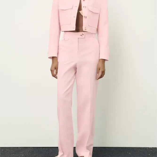 Pink pants and short blazer high with a pink two-piece outfit featuring a linen blend short