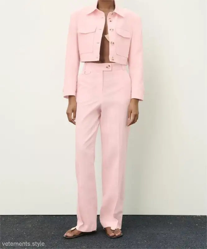 Pink pants and short blazer high with a pink two-piece outfit featuring a linen blend short