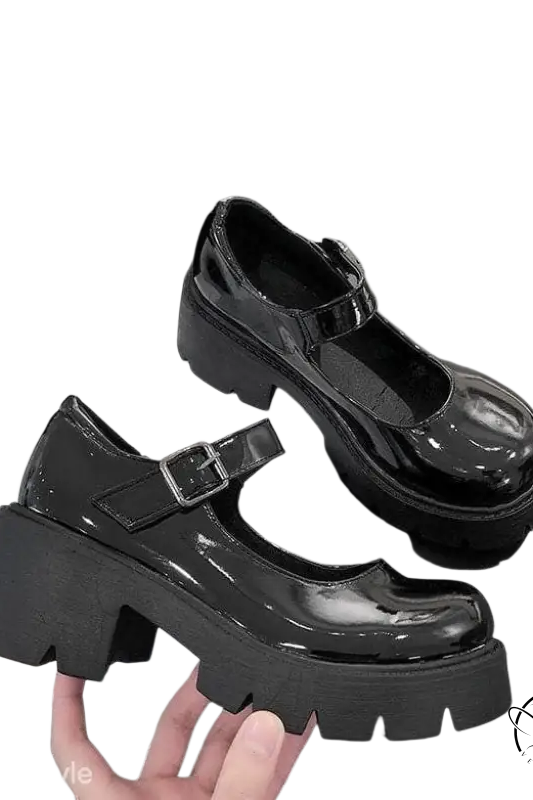 Matte black buckle platform heels with chunky textured sole