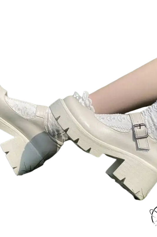 Cream-colored buckle platform heels with lace-up and silver buckle