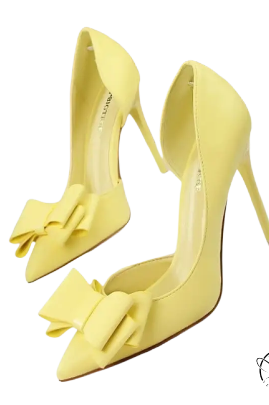 Bright yellow patent leather elegant sweet high-heeled pumps with bow toe