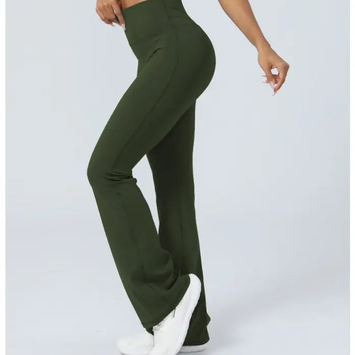 Olive green high-waisted flared leggings styled as casual flared yoga pants for active wear