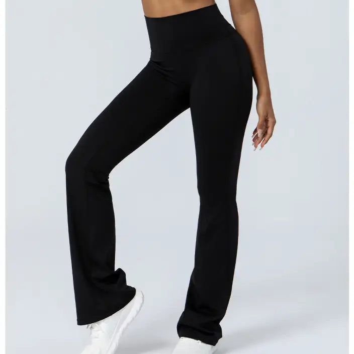 Black flared leggings as part of purplish blue flared yoga pants collection for casual wear