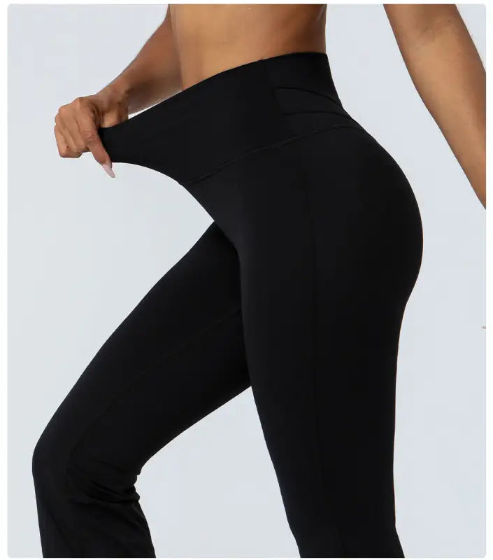 Stretchy black leggings from Purplish Blue Flared Yoga Pants collection for casual flared yoga pants style