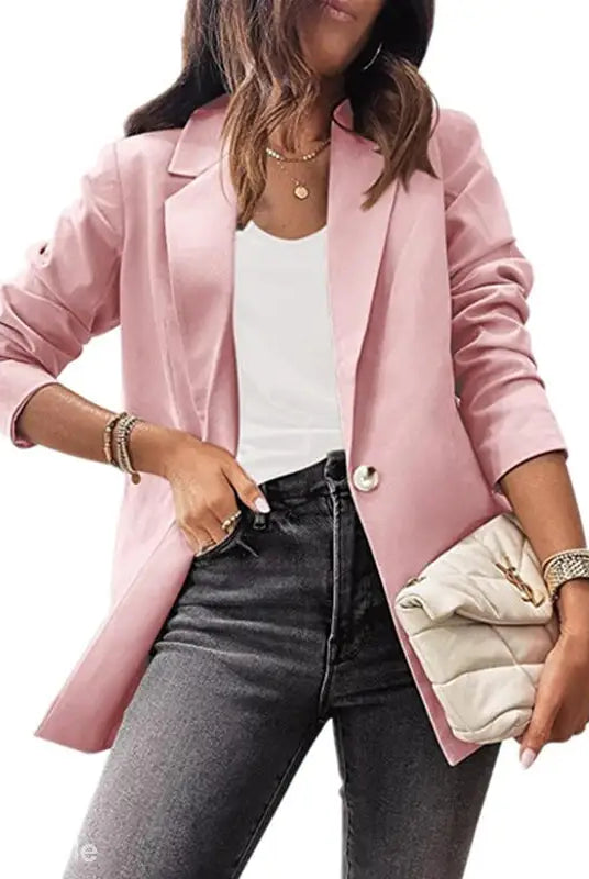 Woman wearing a purplish blue slim fit jacket outfit suitable for office settings