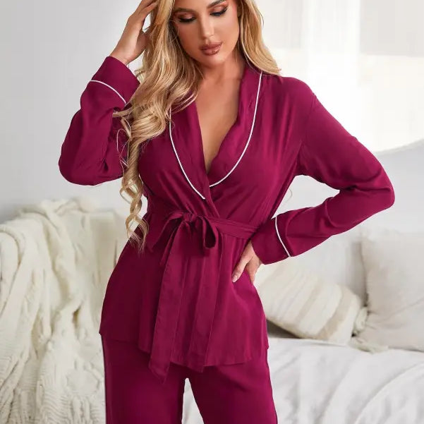 Burgundy pajama set with wrap-style top and matching pants, ideal as red cardigan pajamas