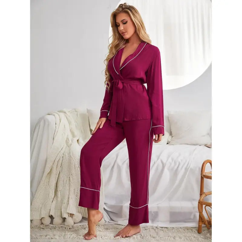 Magenta silk pajama set with white piping, featuring a wrap-style top, ideal for red cardigan pajamas collection