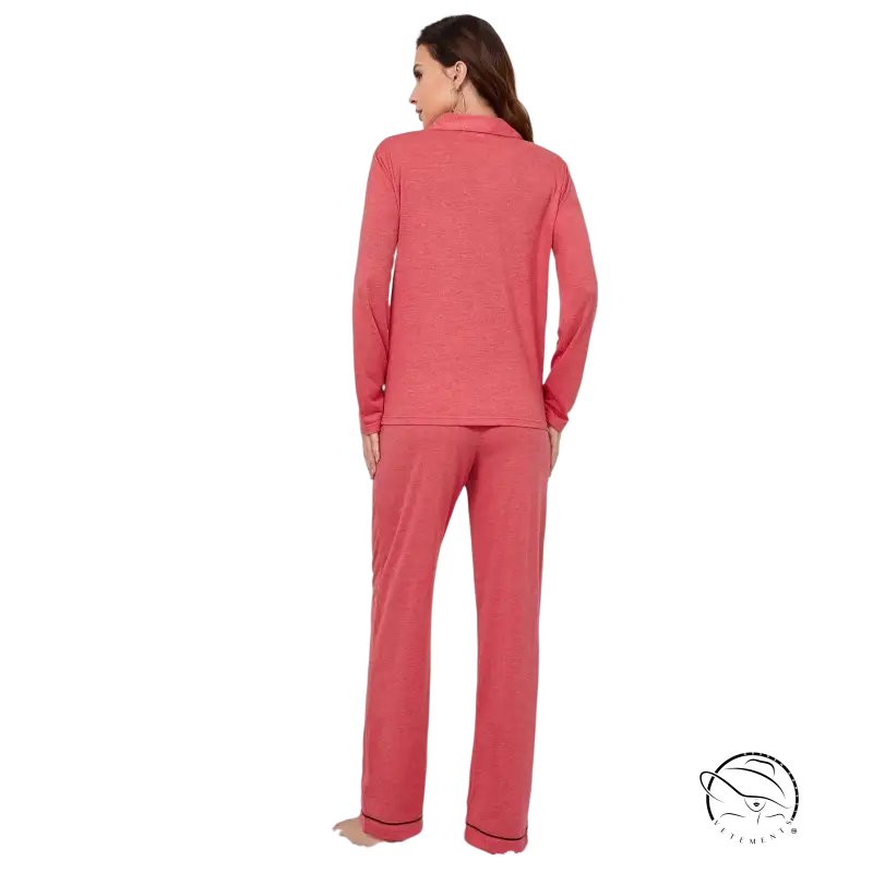 Red long sleeved homewear suit in soft coral with black trim cuffs