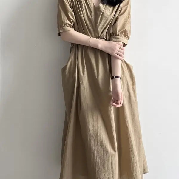 Beige flowy Retro V Neck Pleated Midi Dress with short sleeves and a V-neckline