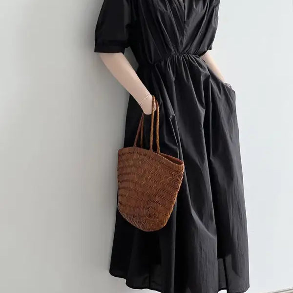Black Retro V Neck Pleated Midi Dress with short sleeves and a cinched waist