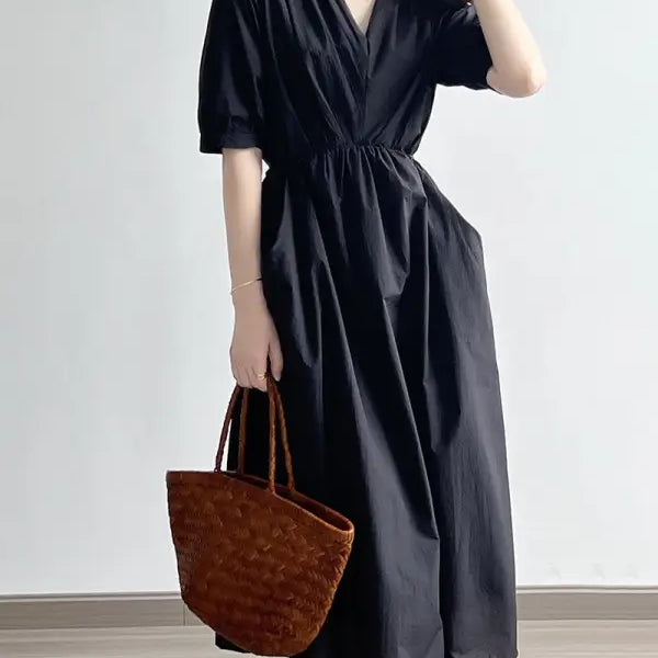 Black Retro V Neck Pleated Midi Dress featuring short sleeves and a cinched waist