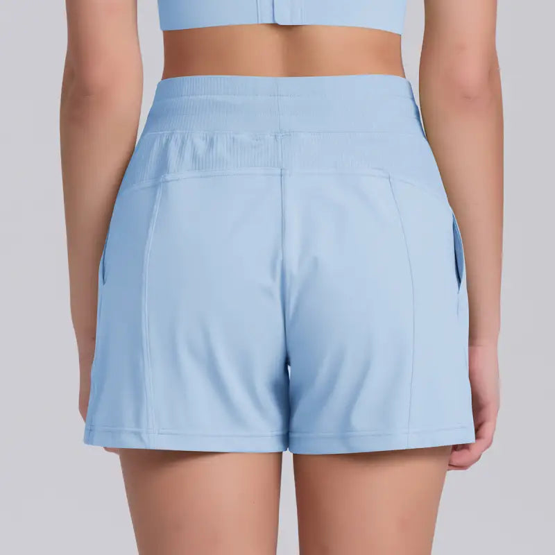 Light blue casual yoga shorts with solid pocket design for comfortable activewear