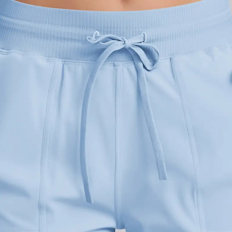 Light blue casual yoga shorts with solid pocket design for comfortable workouts