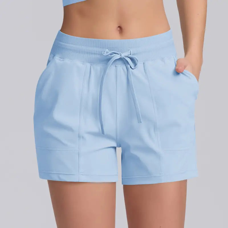 Light blue casual yoga shorts with solid pocket design for comfortable workout wear
