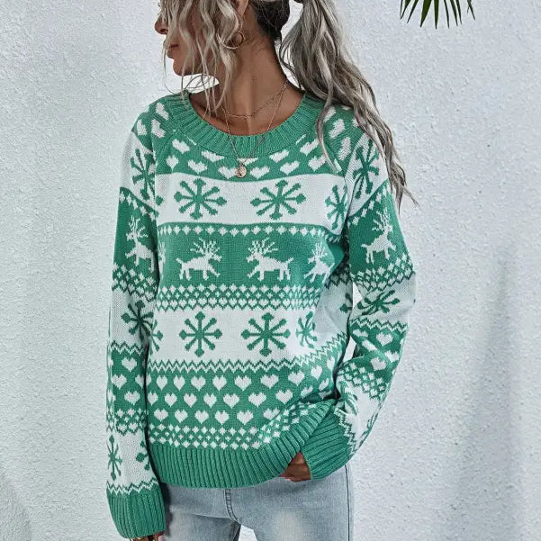 Green and white elk winter knitted Christmas snowflake sweater with reindeer motifs