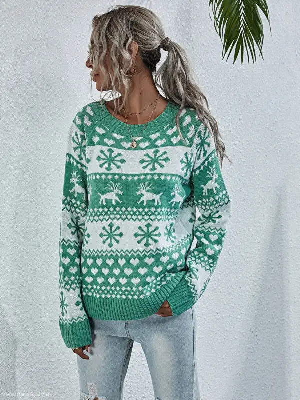 Green and white elk winter knitted Christmas snowflake sweater with reindeer motifs