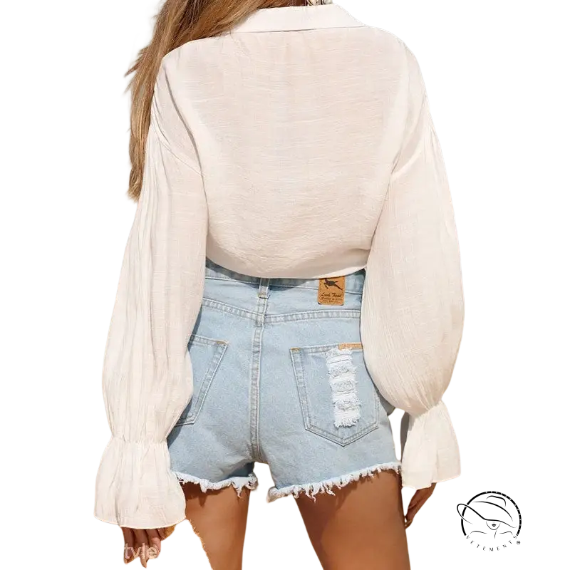 Royal blue boho tie sleeve top with white blouse and denim shorts