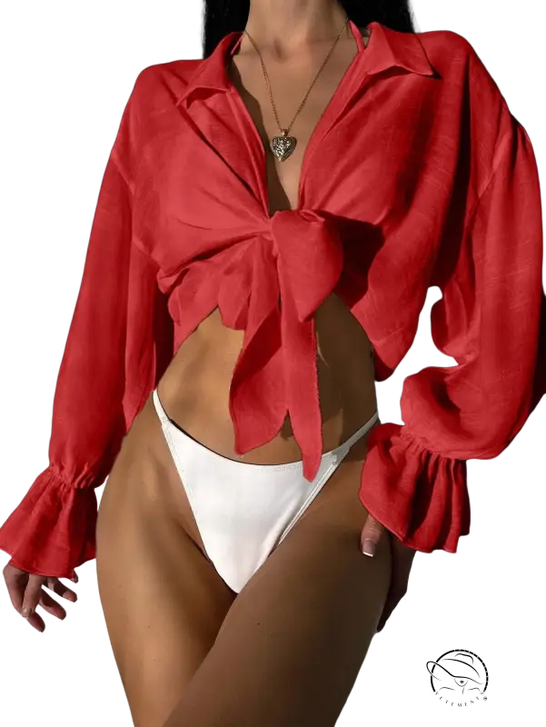 Royal blue tie-front blouse with white bikini bottoms