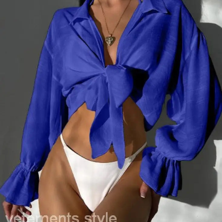 Blue tie-front blouse in royal blue, perfect for summer vacation styling
