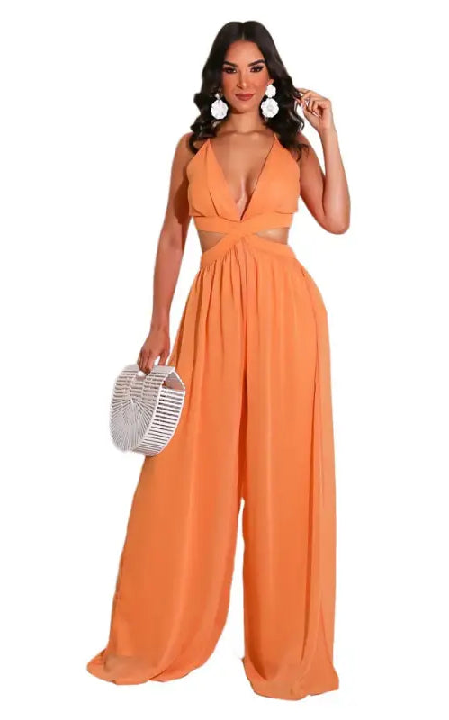 Orange halter-neck jumpsuit with wide-leg pants and cutouts, perfect for casual loose chiffon summer style