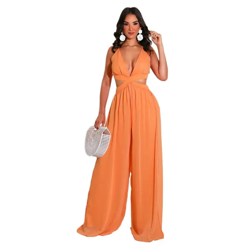 Orange halter-neck jumpsuit with wide-leg pants and cutouts, perfect for casual loose chiffon summer style