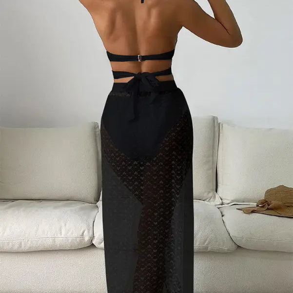 Black halter swimsuit with sheer skirt, part of the Royal Blue Maxi Swimsuit collection