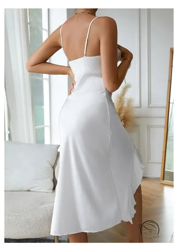 Sapphire blue satin nightdress with spaghetti straps and asymmetrical hem, perfect for sexy charming nightdresses