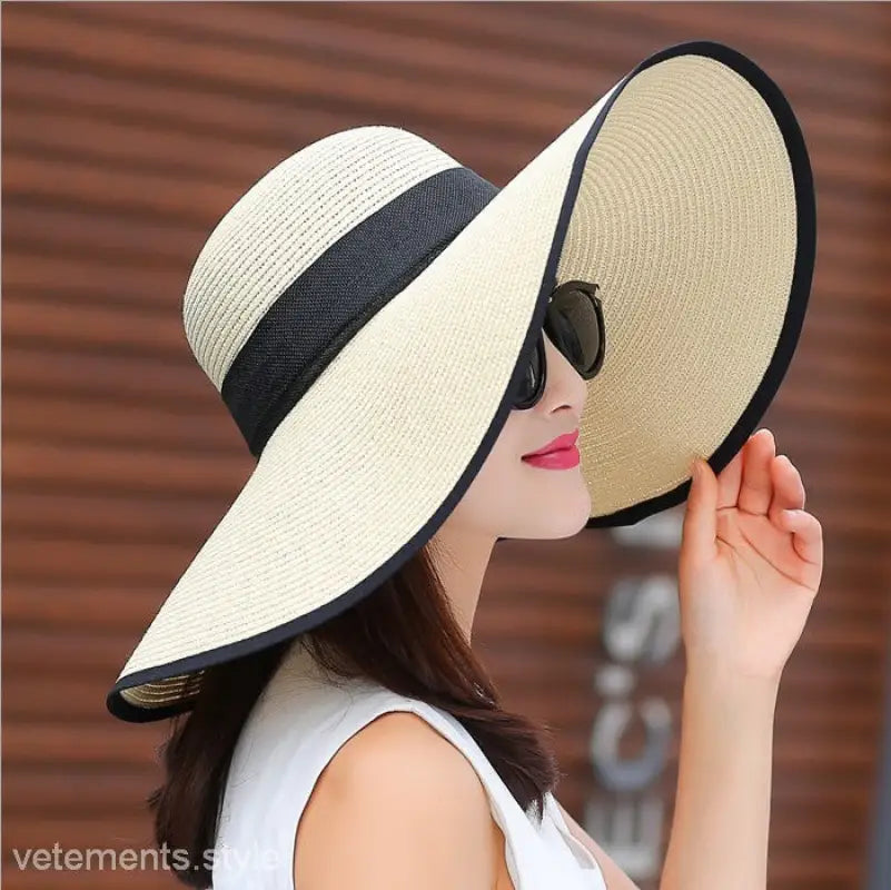 Wide-brimmed Straw Sun Hat with black trim, ideal for navy blue solid and vibrant colors