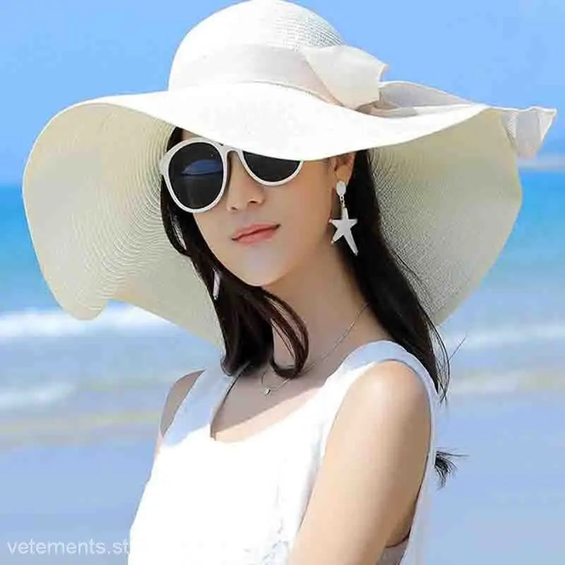 Wide-brimmed white sun hat with ribbon accent from Satin Lace Straw Hat in navy blue solid