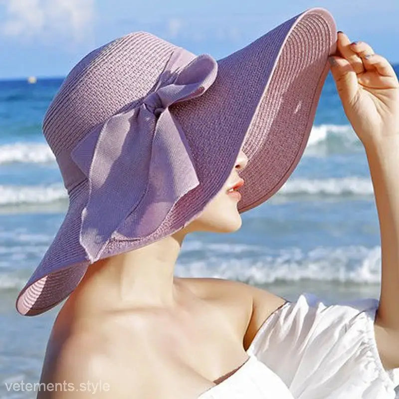 Lavender sun hat with ribbon bow, navy blue solid style, ideal for outdoor fashion