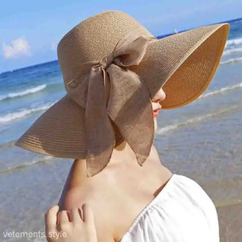 Wide-brimmed Navy Blue Solid Satin Lace Straw Hat with a large bow for stylish summer wear