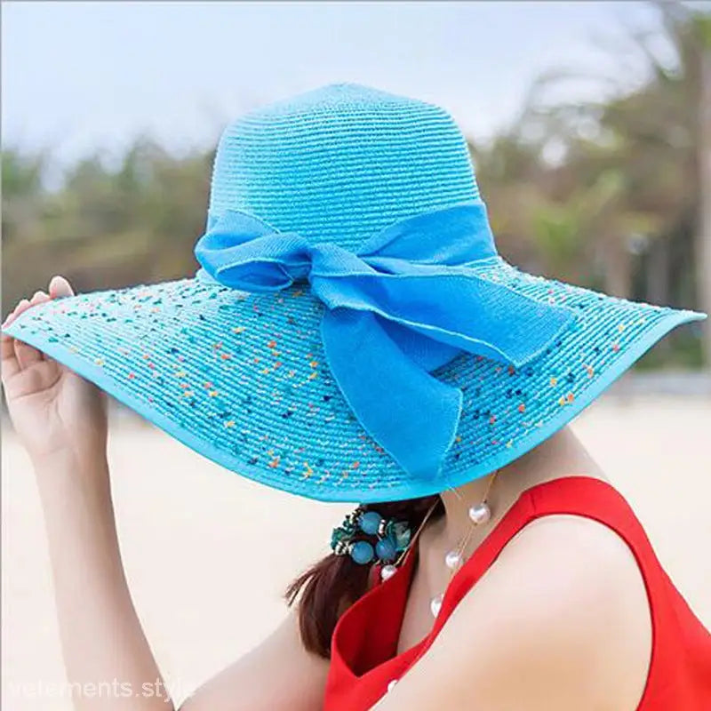 Bright blue wide-brimmed sun hat with ribbon, colorful speckles, ideal for Navy Blue Solid styles
