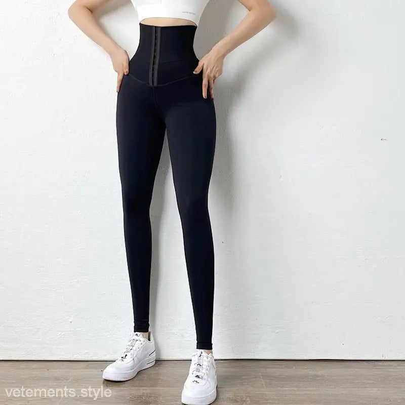 High-waist slim fit sculpt style leggings with corset waistband and white sneakers