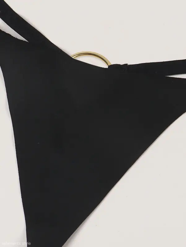 Black triangular fabric piece with a gold ring, part of Seasonless Nylon Ice Silk Panties collection