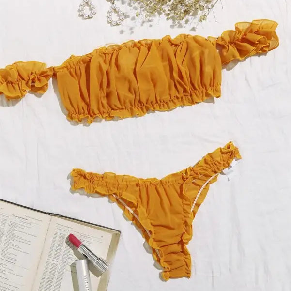 Mustard yellow ruched bikini set showcasing sexy ruffle lingerie with bandeau and thong