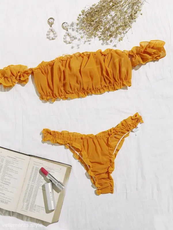 Mustard yellow ruched bikini set showcasing sexy ruffle lingerie with bandeau and thong