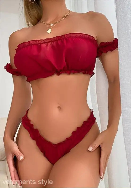 Red off-shoulder bikini set featuring ruffled edges and gold necklace in sexy ruffle lingerie