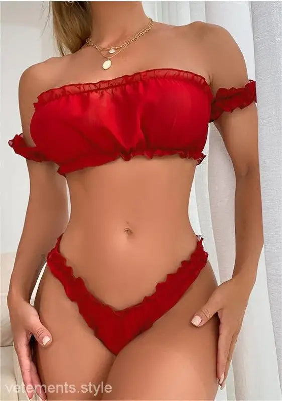 Red off-shoulder bikini set showcasing sexy ruffle lingerie with ruffled edges